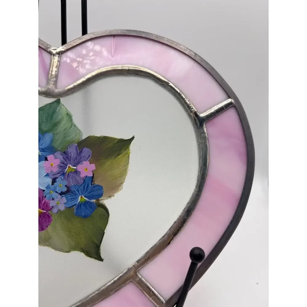 Stained glass heart. With a hand painted floral design.
